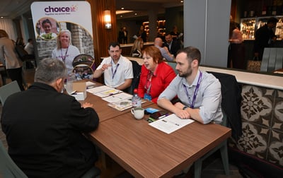 People sitting at a table talking at NI Chamber's Meet the Buyer event People sitting at a table talking at NI Chamber's Meet the Buyer event